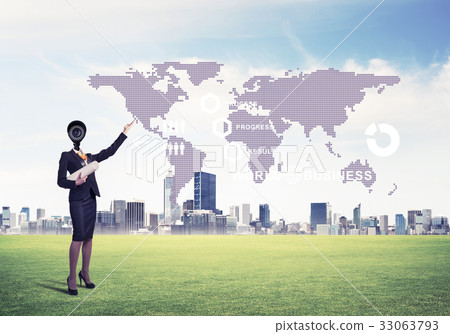 Camera headed woman standing on green grass against modern citys Camera headed woman standing on green grass against modern citys 33063793
