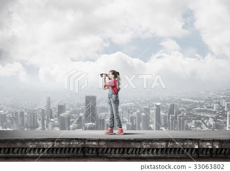 Concept of careless happy childhood with girl of school age look Concept of careless happy childhood with girl of school age look 33063802