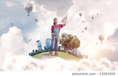 Concept of careless happy childhood with girl dreaming about fut 33063804