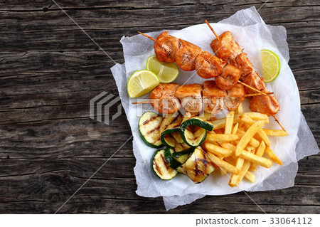 delicious chicken shish kebabs on skewers delicious chicken shish kebabs on skewers 33064112