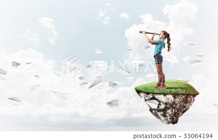 Concept of careless happy childhood with girl looking in spyglas Concept of careless happy childhood with girl looking in spyglas 33064194