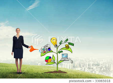 Young businesswoman outdoors watering drawn growth concept with can 33065018