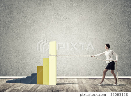 Businesswoman pulling garph with rope as symbol of power and control Businesswoman pulling garph with rope as symbol of power and control 33065128