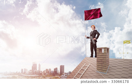 Young businessman with flag presenting concept of leadership. Mixed media Young businessman with flag presenting concept of leadership. Mixed media 33066178