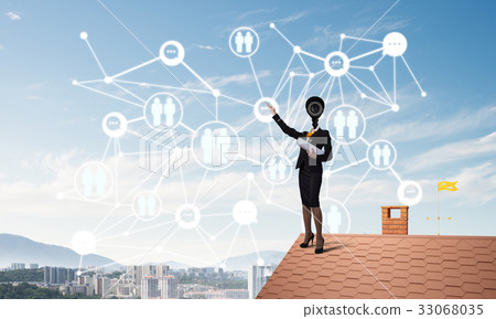 Concept of security and privacy protection with camera headed woman 33068035