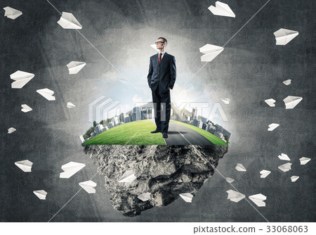 Confident boss and modern city as concept of eco green construct Confident boss and modern city as concept of eco green construct 33068063