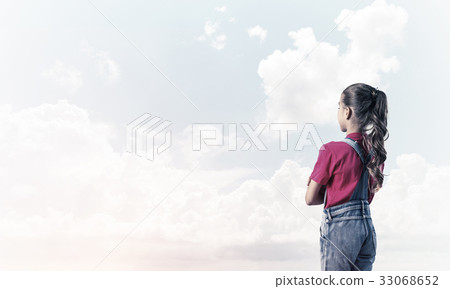Concept of careless happy childhood with girl looking in future Concept of careless happy childhood with girl looking in future 33068652