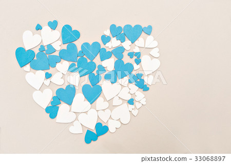Wooden hearts, blue and beige color. forming a Wooden hearts, blue and beige color. forming a 33068897