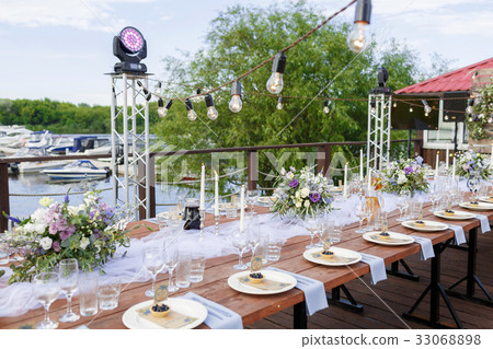 Glasses on the festive table setting. Wedding Glasses on the festive table setting. Wedding 33068898