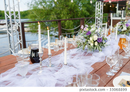 Glasses on the festive table setting. Wedding Glasses on the festive table setting. Wedding 33068899
