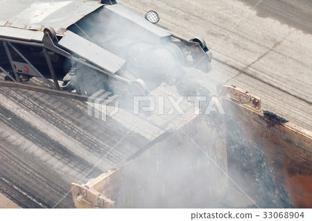 Road works. Asphalt removing machine loading Road works. Asphalt removing machine loading 33068904