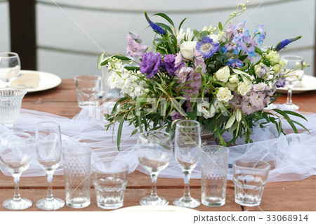 Glasses on the festive table setting. Wedding Glasses on the festive table setting. Wedding 33068914
