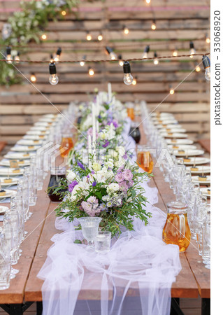 Glasses on the festive table setting. Wedding Glasses on the festive table setting. Wedding 33068920