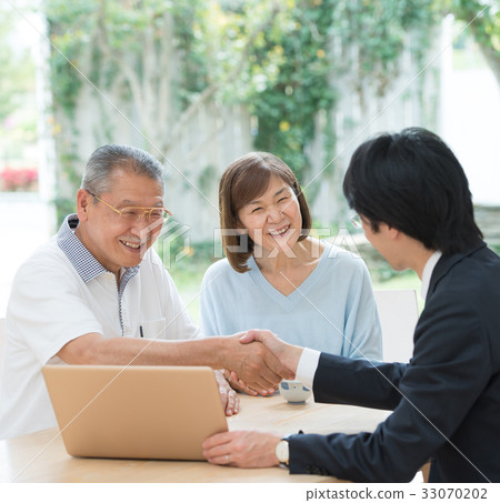Senior couple businessmen business talk Senior couple businessmen business talk 33070202