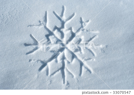 Snowflake written in snow Snowflake written in snow 33070547