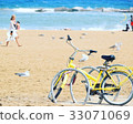 Bicycles placed on the coast of Barcelona 33071069