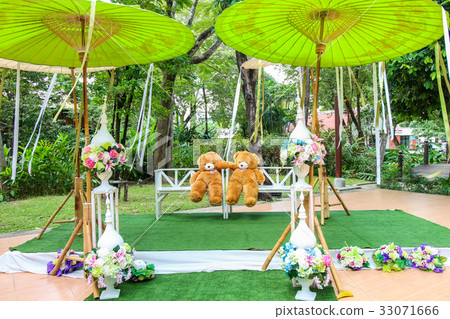 Two of teddy bear sit on the chair in the wedding Two of teddy bear sit on the chair in the wedding 33071666