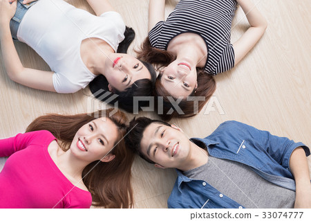 Young People Lying On Floor Stock Photo 33074777 Pixta