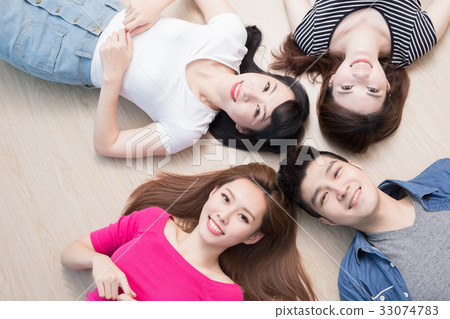 Young People Lying On Floor Stock Photo 33074783 Pixta