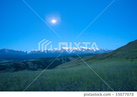 Beautiful sunny valley between mountains with lush Beautiful sunny valley between mountains with lush 33077078