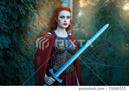 Girl holding a sword. Girl holding a sword. 33080155