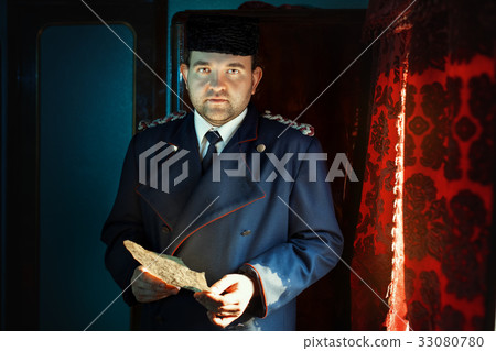 Sad man holding a letter. 33080780