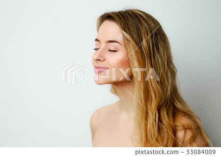 Smiling Blonde Woman Profile Portrait Smiling Blonde Woman Profile Portrait 33084009