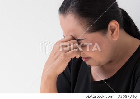 stressed middle aged woman with headache, tension stressed middle aged woman with headache, tension 33087380