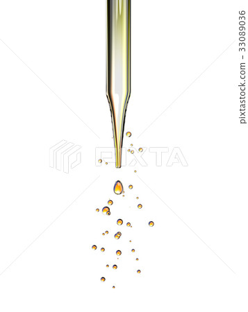 transparent glass pipette with a Golden liquid 33089036