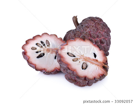 whole and half cut ripe custard apple (red skin) 33092057