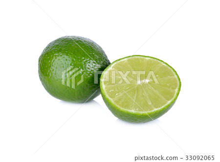 whole and half cut fresh lime on white background 33092065