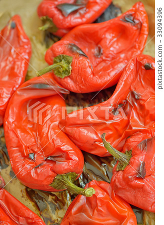 Red bell roasting in the oven 33094396