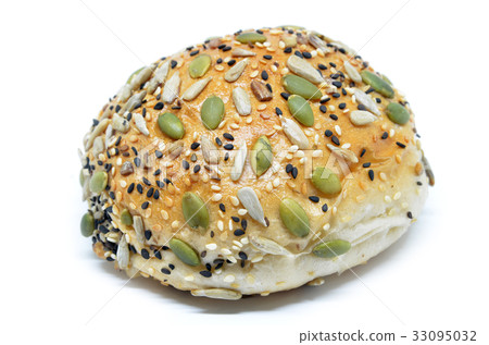 图库照片: bun with pumpkin seed, sunflower seed and sesame