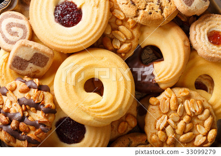 Sweet delicious cookies assorted close-up 33099279