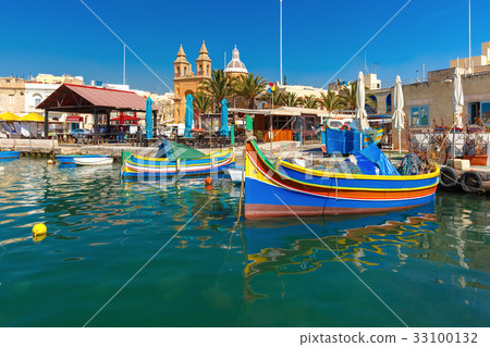 Taditional eyed boats Luzzu in Marsaxlokk, Malta Taditional eyed boats Luzzu in Marsaxlokk, Malta 33100132