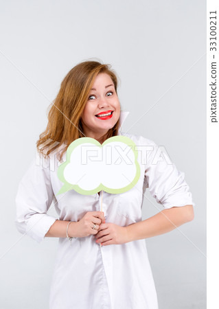 Woman holding blank speech bubble copy space 33100211