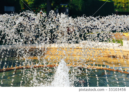 fragment of fountain water drops in the air fragment of fountain water drops in the air 33103456