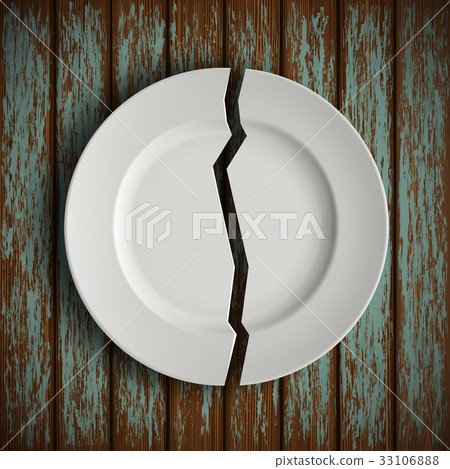 broken white plate on old wooden table broken white plate on old wooden table 33106888