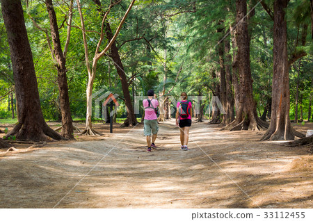 Tourists on trail at way to Phraya Nakorn cave 33112455