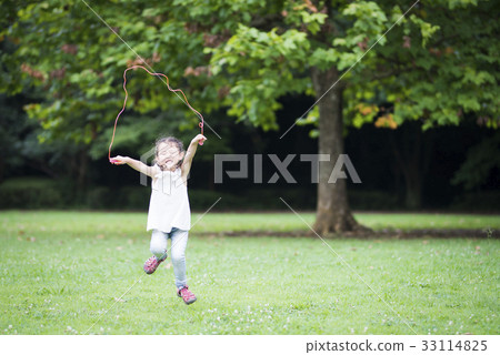Girls practicing jump rope Girls practicing jump rope 33114825