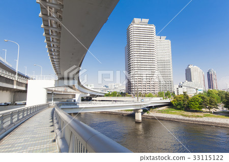 Tower apartment and bridge along the river 33115122