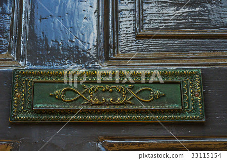 Old letterbox in the door 33115154