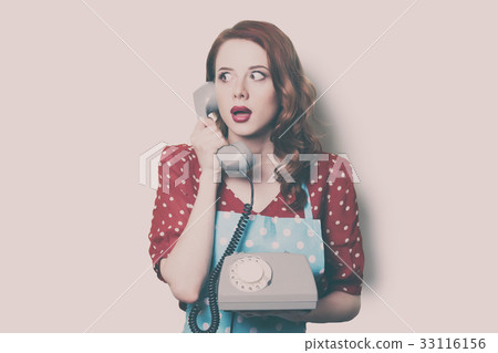 woman with retro phone 33116156