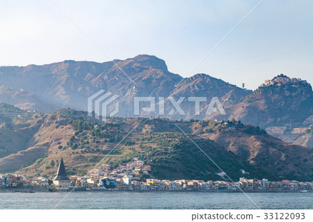 view of Giardini Naxos town in summer sunset view of Giardini Naxos town in summer sunset 33122093