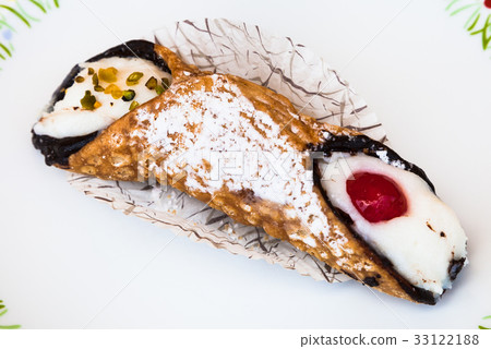 typical sicilian pastry Cannoli on plate 33122188