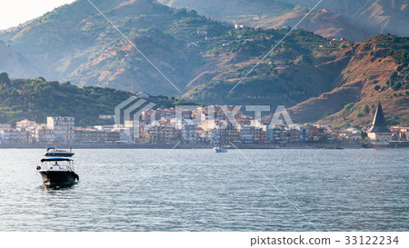 view of Giardini Naxos town in summer evening view of Giardini Naxos town in summer evening 33122234