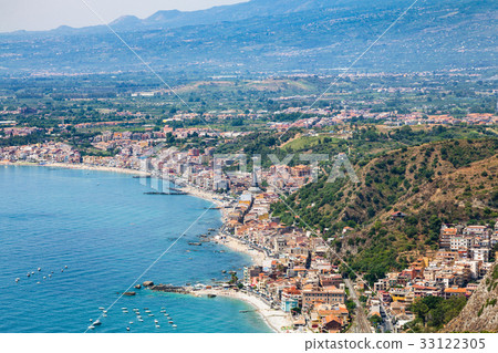 view of Giardini Naxos town on Ionian Sea beach view of Giardini Naxos town on Ionian Sea beach 33122305
