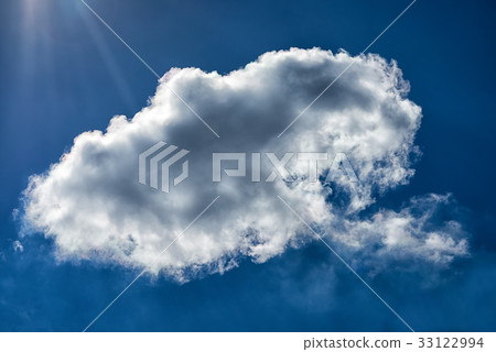 One cloud and sunbeams in the blue sky 33122994