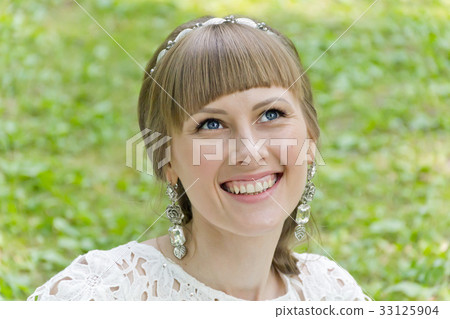 Beautiful bride in white lace dress 33125904