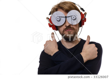 portrait young man listen to music thumbs up portrait young man listen to music thumbs up 33126007